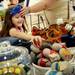 Six-year-old Grace Heard, of Ann Arbor, reaches for an item as her mom Kitty adjusts her tiara as they browse at Anthropologie during the grand opening of Arbor Hills on Thursday, August 22, 2013. Melanie Maxwell | AnnArbor.com